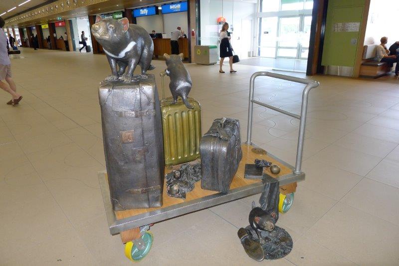 Tasmanian Devil scuplture with suitcases