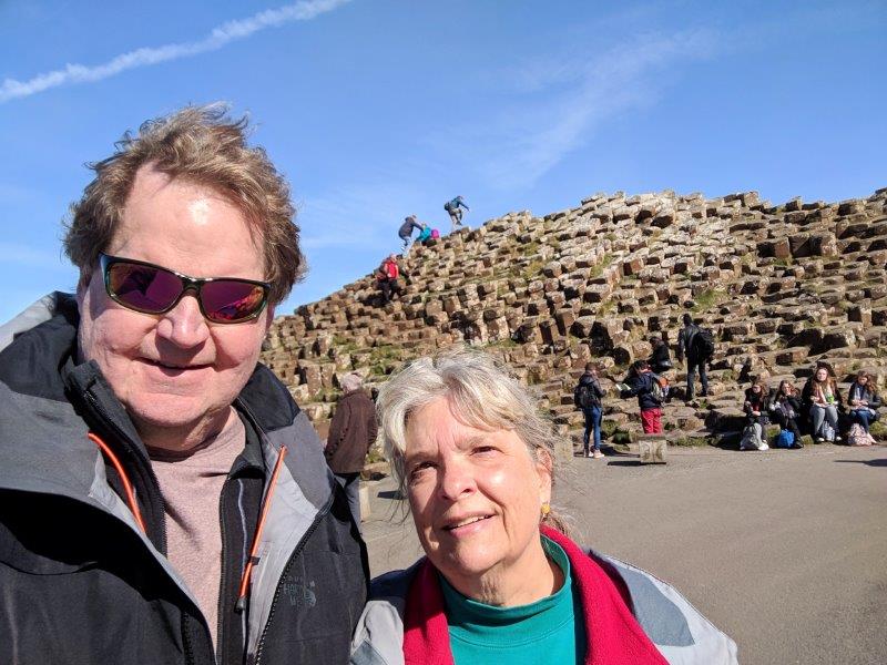 Mark and Susan in front of the pillars at Giants Causeway.