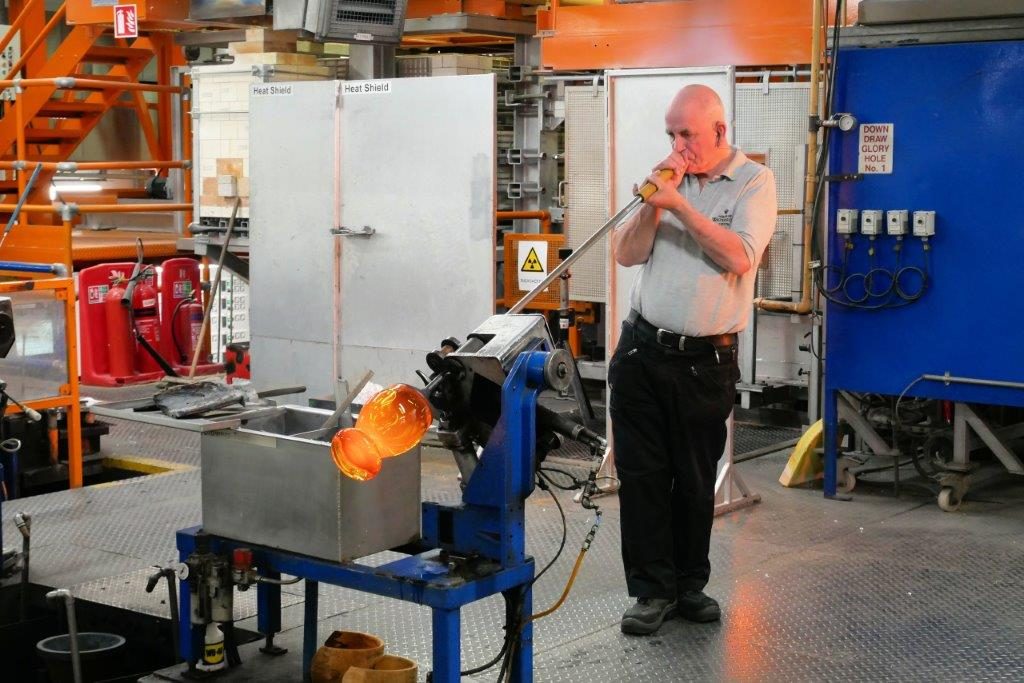 A man blowing glass in the Waterford factory